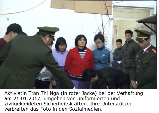 Aktivistin Tran Thi Nga (in roter Jacke) bei der Verhaftung am 21.01.2017, umgeben von uniformierten und zivilgekleideten Sicherheitskrften. Ihre Untersttzer verbreiten das Foto in den Sozialmedien.