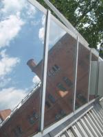 Fertighaus, Plusenergiehaus @ Hausbau-Seite.de | Foto: Dachfenster mit Sonnenschutzfolie - Auenansicht.